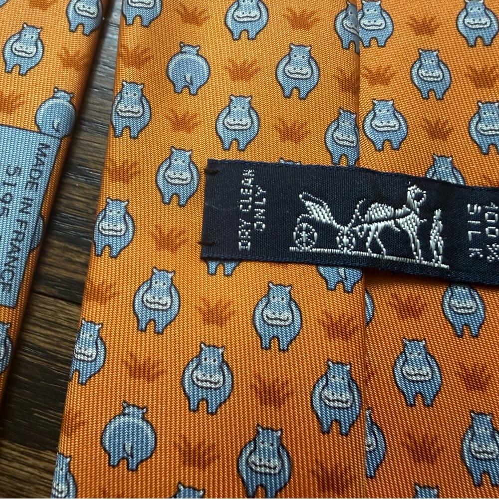Hermes Orange Silk Tie with Blue Hippo Pattern